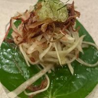 Peanut & papaya relish, pomelo, betel leaf & finger lime $9.00  at Nu Nu in Palm Cove