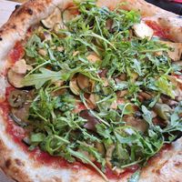 Vegan pizza with plant mozzarella, zucchini, ruccola, jalapeño. at Pelso di Napoli in Balatonlelle