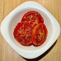 Herb roasted tomatoes  at Novotel Bucharest City Centre Breakfast Restaurant  in Bucharest