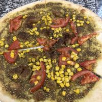 Zatar Pizza mit Mais & Tomate 7,50€  at Big Joe Falafel in Linz