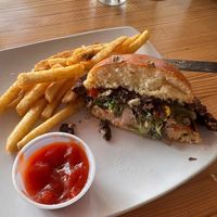 Half eaten black bean burger   at Tiny's Coffee Bar in Gary