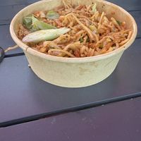 This was the Szechuan noodle dish after we ate a bunch off the top. It was overflowing.  at Sri Annapoorani in South Jordan