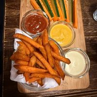 dipping plate with fries at Kozmosz Vegan Etterem in Budapest