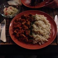 Seitan stew with dumplings and pickles at Kozmosz Vegan Etterem in Budapest