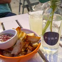 Baked potatoes with fermented cashew cheese  at PURA in San Isidro