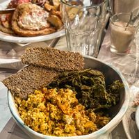 Tofu scramble with kale chips and raw crackers  at PURA in San Isidro