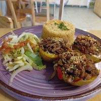 Canasta de patacón con verduras y proteína vegan, arroz rojo y ensalada clásica. at La Ruda Casa Cultural in Bogota