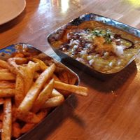 Masala fries and ragada patties at Poppadom & Pints in England