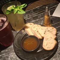 Complementary bread with a chili oil and a smoked pepper spice-mix.
Drinks where a violet-blueberry lemonade as well as a lime-mint lemonade. The lime-mint one was really good. at Vaust Bar & Restaurant in Berlin