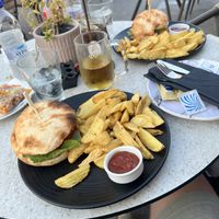 Vegan burger with fries  at Giannou Kentriko cafe in Kos