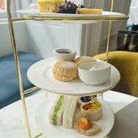 Sandwiches, cakes, scones with cream and jam  at The Orangery at Kensington Palace in London