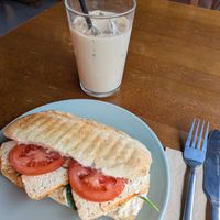 Tofu and tomato sandwich and an iced oat latte at The Sheffield Bolthole in Sheffield