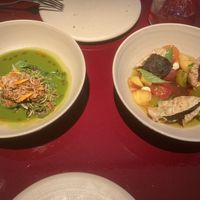 Grilled salad on green gazpacho with peanut crunch and tomato, peach, fig leaf salad with nori and rice crackers  at lara  in Vienna