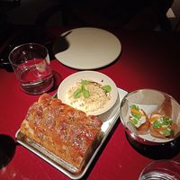 Delicious glazed focaccia with artichoke cream. Fried potato croquettes with yuzu dip 😋 at lara  in Vienna