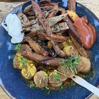Vegane Currywurst mit Süßkartoffel-Pommes  at HAFEN DOMMEL  in Rostock