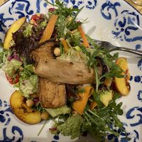 Salad with grilled peaches and king oyster mushrooms  at Trattoria Officina in Wien