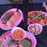 Bistro steak sandwich, native nachos, and the native chicken, bacon, avo club at Native Foods - Point Loma in San Diego