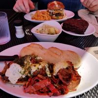 Meatball Sub
Spicy seitan meatballs, marinara, caramelized
onions, roasted red peppers, pumpkin seed
pesto, creamy ranch and parmesan. Served on
toasted baguette.  at Native Foods - Point Loma in San Diego