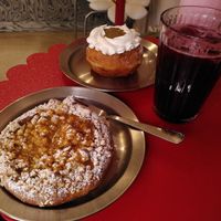 Apricot and caramel bun, pistachio doughnut, blueberry lemonade at Kostki in Warsaw