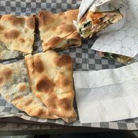 Spinach manakeesh and falafel wrap   at Levande Bakery & BBQ in Toronto