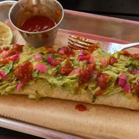 Burrito with cauliflower chorizo and a plethora of toppings(I loaded it up myself). at Fuego Tacos & Mezcal in Winchester