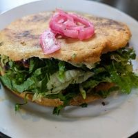 The Gordita is awesome! Ask no cheese or crema, sub cauliflower chorizo, add extra pickled red onions and hot sauce! at Fuego Tacos & Mezcal in Winchester