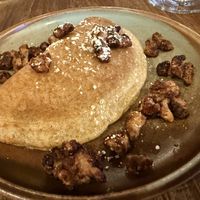 Qatayef (V)
Baked "crepe" stuffed with walnuts and cinnamon drizzled with house syrup and caramelized walnuts  at Levant in Petaluma