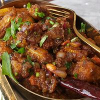 Babycorn karivepaku ($15). Spicy, savory babycorn dish. Wish it had been crispier, but it's still good. at Simply South - Indian Vegetarian Restaurant in Warrenville