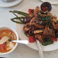 Tom kha soup and drunken mushroom noodles. at Araya's Place - Madison St in Seattle