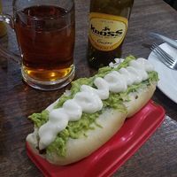 Completos with a local beer at Soju in Santiago