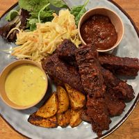 BBQ glazed seitan ribs. Unfortunately a disappointment. The ribs was over cooked -dry, hard and had almost no flavour to them. The red sauce was ok but the yellow had no flavour.  at Veggokoket in Vasteras