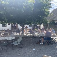 Outdoor seating in the courtyard  at Olof Viktors Café in Skåne Län