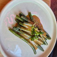 Side of beans with gomma sauce, yummy! at Desoriente - Granados in Barcelona