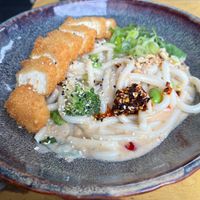 tofu and udon noodles with broccoli in peanut sauce, was quite mild so we added extra chilli at LêLê in Berlin
