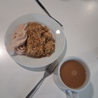 Apple and rhubarb crumble with plum ice cream at Community Cafe in North London