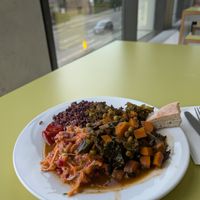 stew (mushrooms, peas, kale, root vegetables) with black rice and salad on the side at Community Cafe in North London