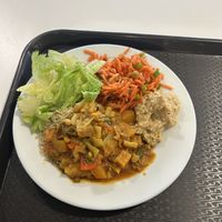 stew, brown rice and veggies for a main plate worth £5.85  at Community Cafe in North London