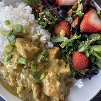 Vegan butternut squash curry with side salad  at Next Chapter Cafe in Bellingham