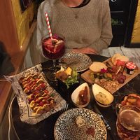 Assortiment of vegan tapas + sangria and beer   at Bubita Bar in Barcelona