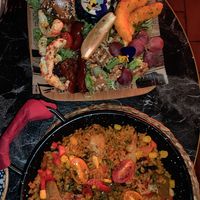 Sea food plate and chicken paella at Bubita Bar in Barcelona