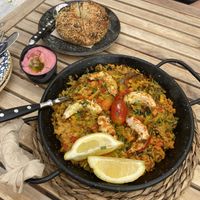 Seafood paella, bagel, hummus  at Bubita Bar in Barcelona