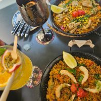 Monalisa and Morgana drinks. Faux seafood and chicken paellas at Bubita Bar in Barcelona