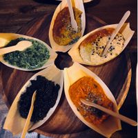 Sauce ‘boats’ with pita bread at Bubita Bar in Barcelona