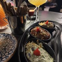 hummus, dried tomato and edama dipp with breadsticks at Bubita Bar in Barcelona