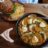 The Queen burger and the paella dishes at Bubita Bar in Barcelona