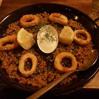 Del chef paella, served with 'Calamari' rings at Bubita Bar in Barcelona