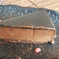 Chocolate cake with blueberries. Excellent at Veganda in Padua