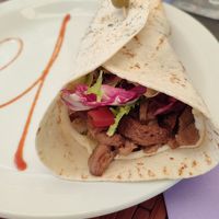 Vegina (piadina) Rustic. Ovvero con straccetti di seitan al rosmarino, maionese e formaggio veg, insalata, pomodoro at Veganda in Padua