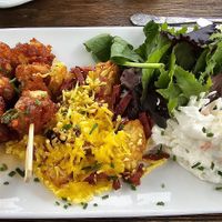 Gochugang Tofu skewers with loaded hash browns substituted in at Inn on the Lake  in Gravesend