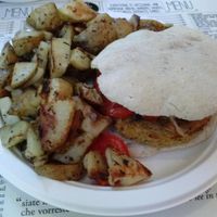 burger with potatoes at Panino Vegano in Florence